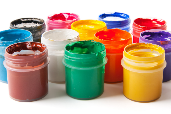 Cups of colorful paint.